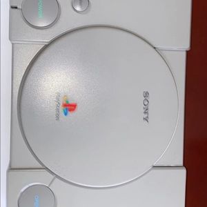 Sony PlayStation 1 console with Tomb rider 2